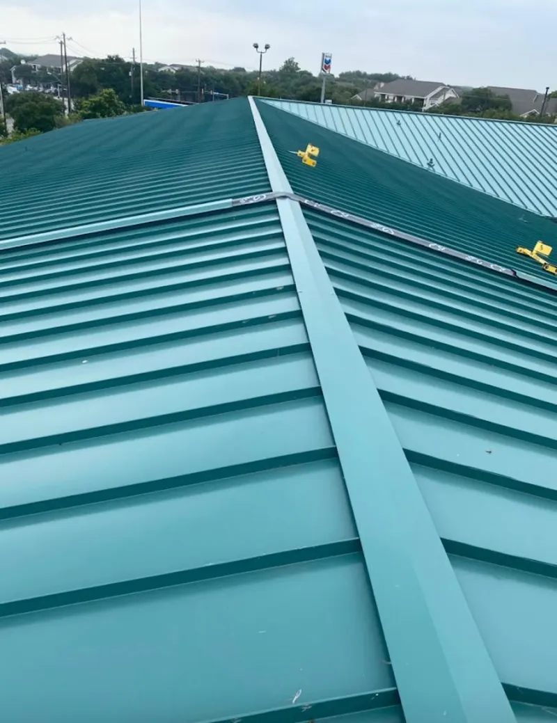 Green commercial metal roof ridge and valley for Metal Roof Repair in Ellington